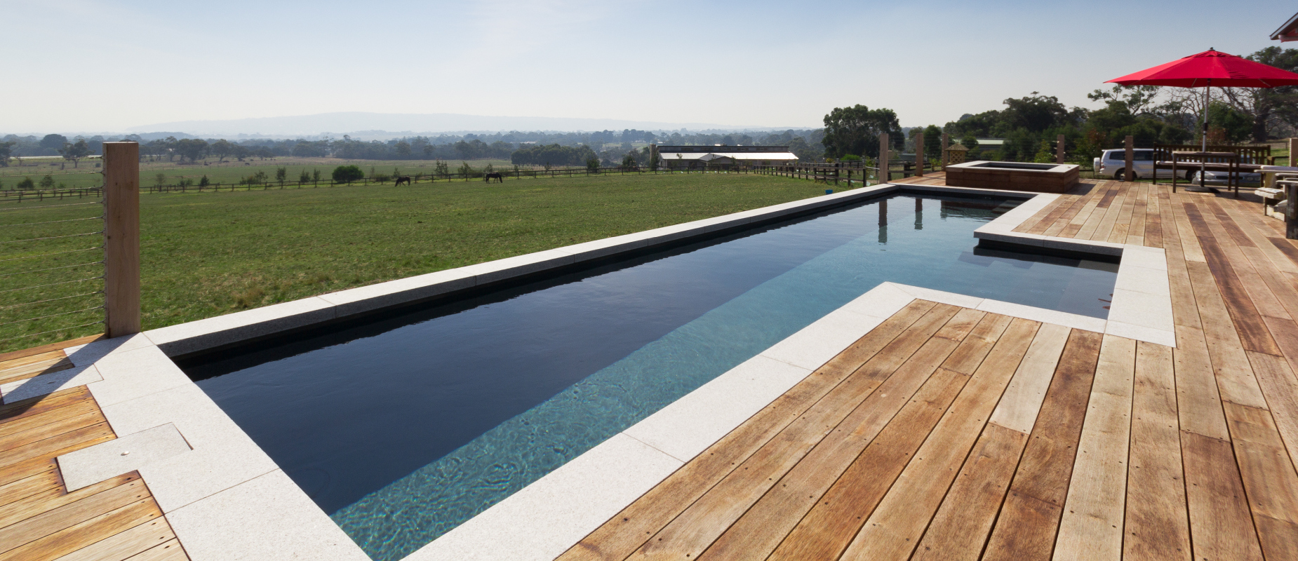 Compass-Pools-Australia_Fastlane-lap-pool-with-timber-decking